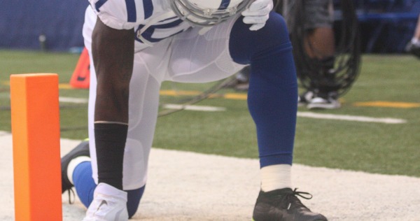 NFL player taking a knee